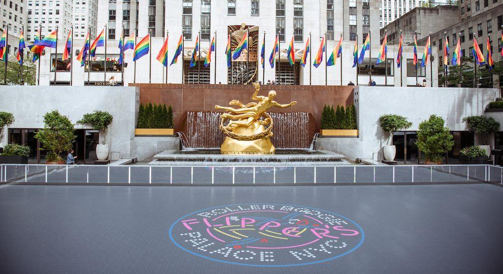 Pride flags on display around Flipper's Roller Boogie Palace at The Rink