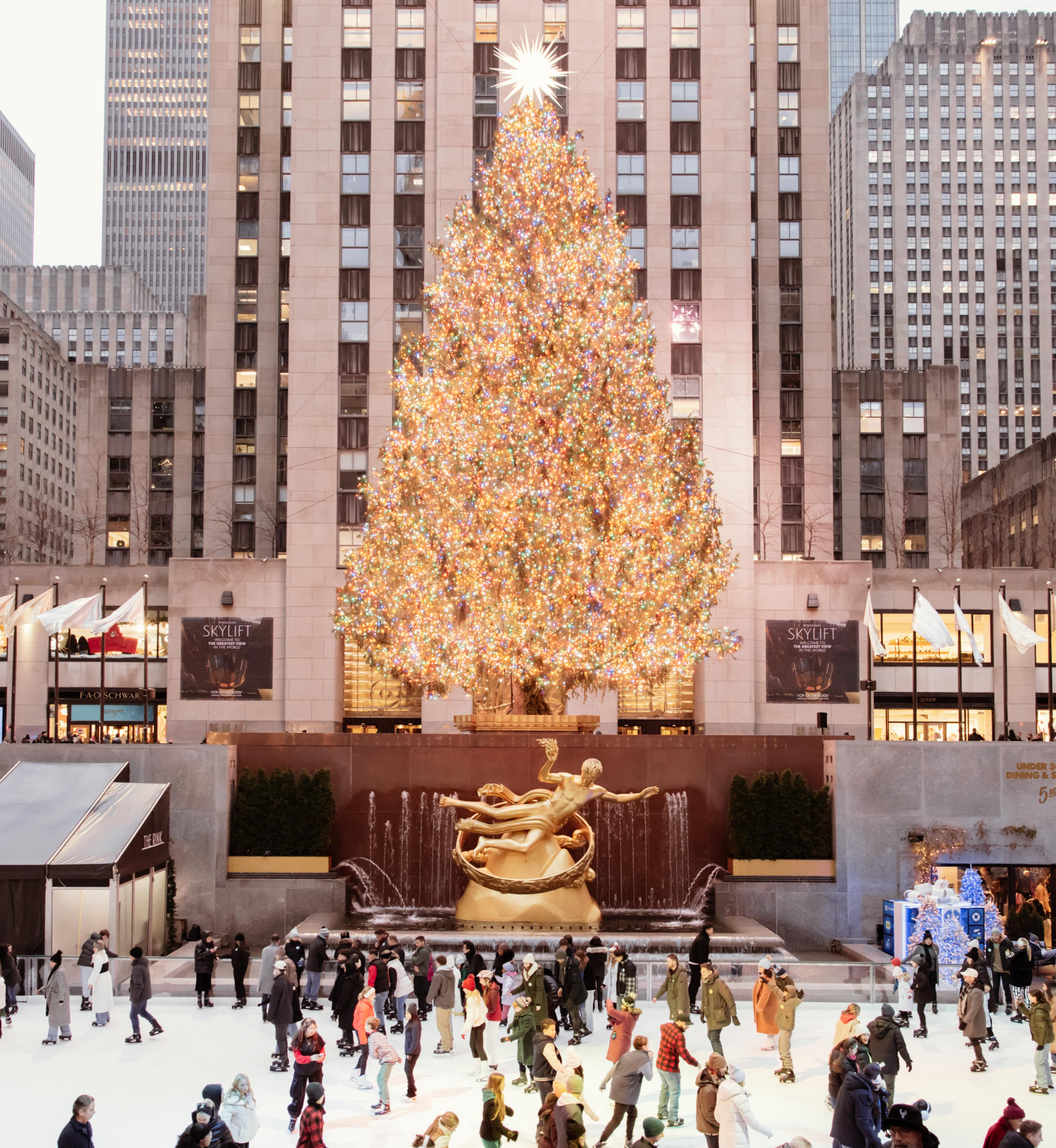 Large group of people ice skating at The Rink at Rockefeller Center Presented by Chase Freedom