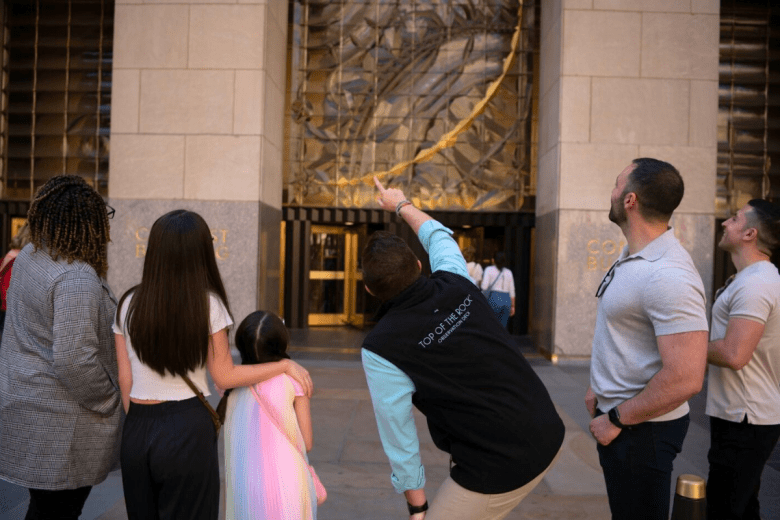 kids looking at art on a tour of Rockefeller Center