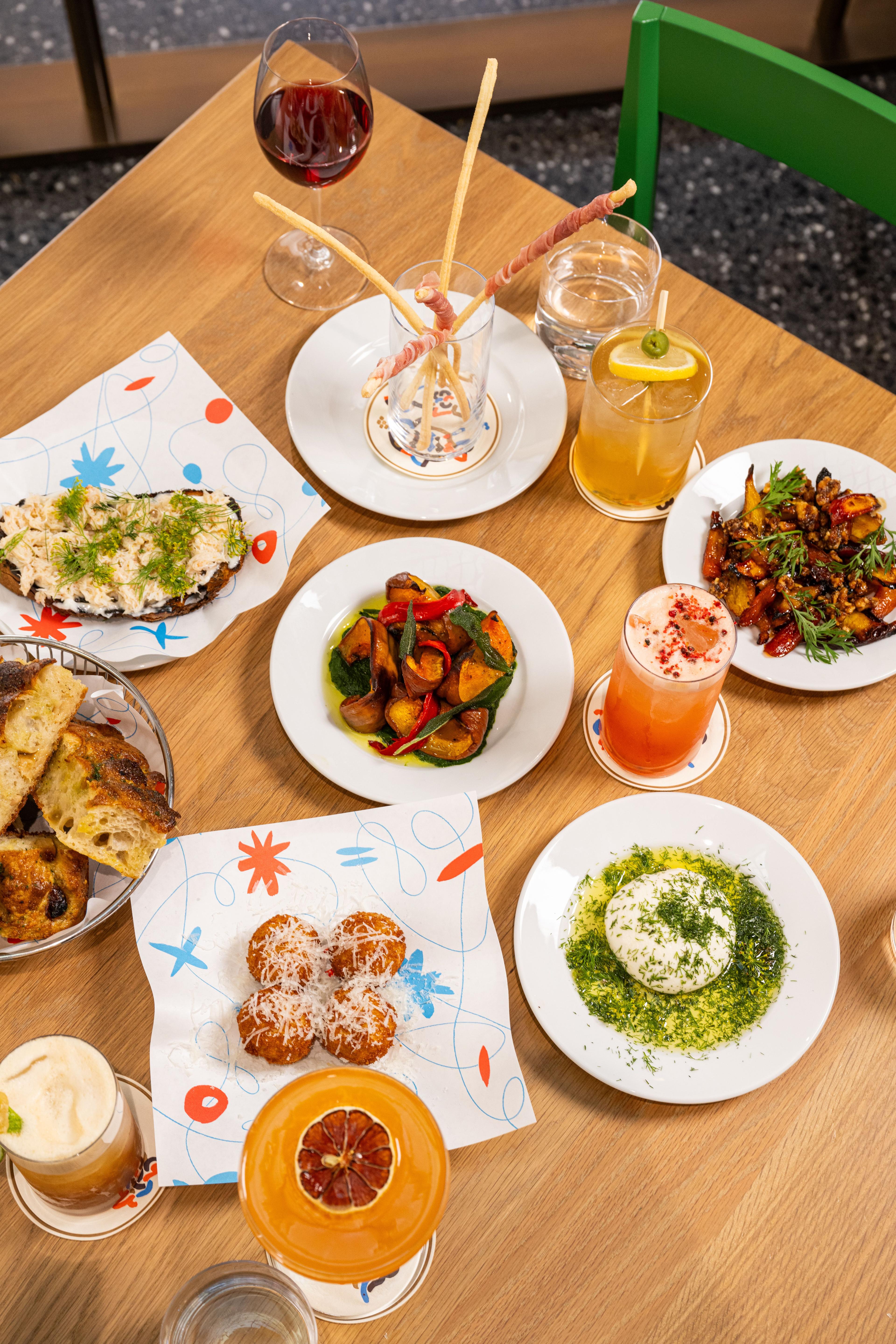 plates of food and drinks on a table