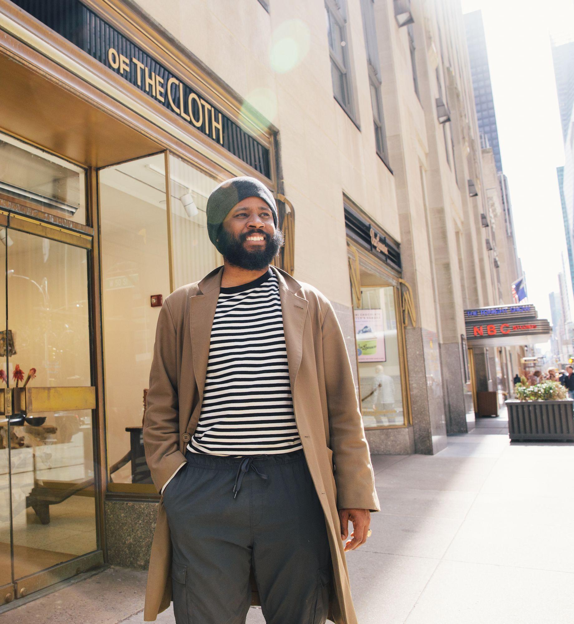 Founder Tione Trice stands in front of Of The Cloth's Rockefeller Center location
