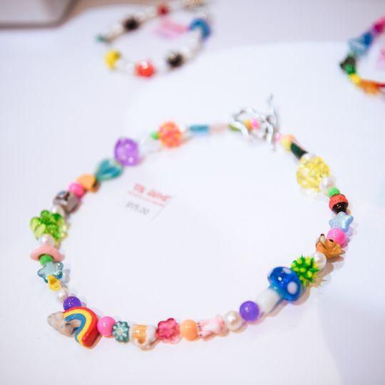 Ian Charms necklace on display