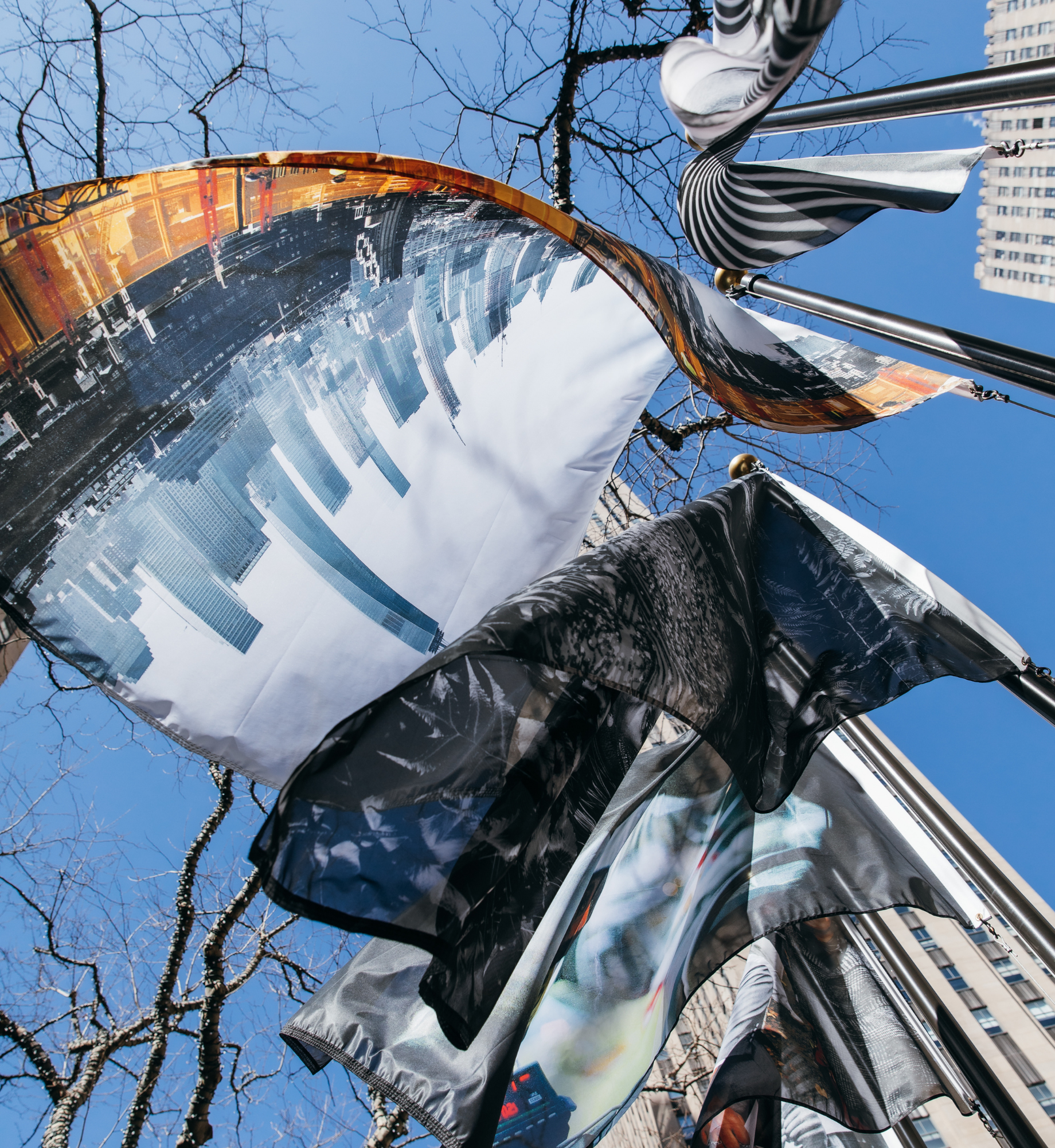 A Flag from the 2021 Flag Project flying at Rockefeller Center