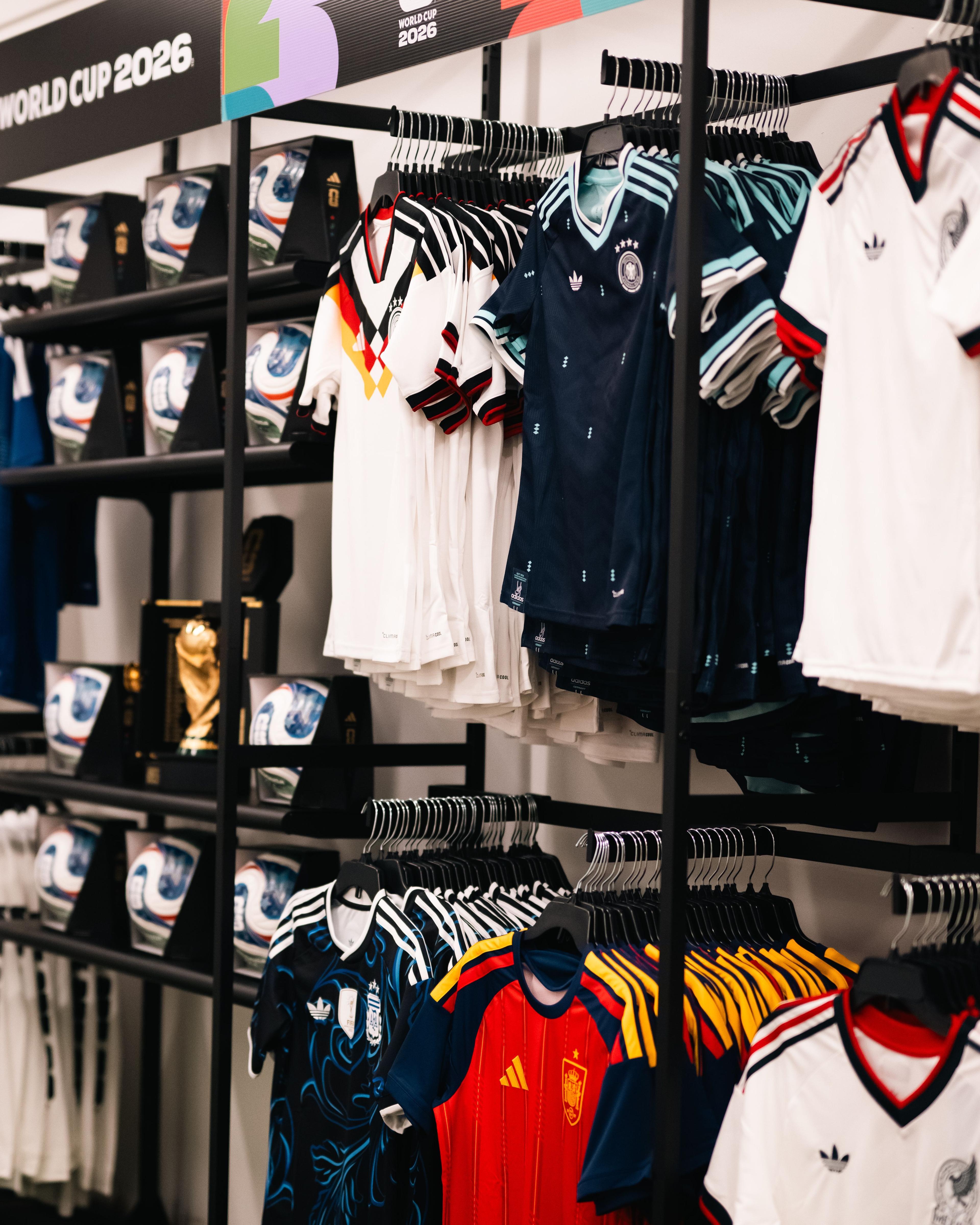 fifa retail store jerseys displayed on a shelf