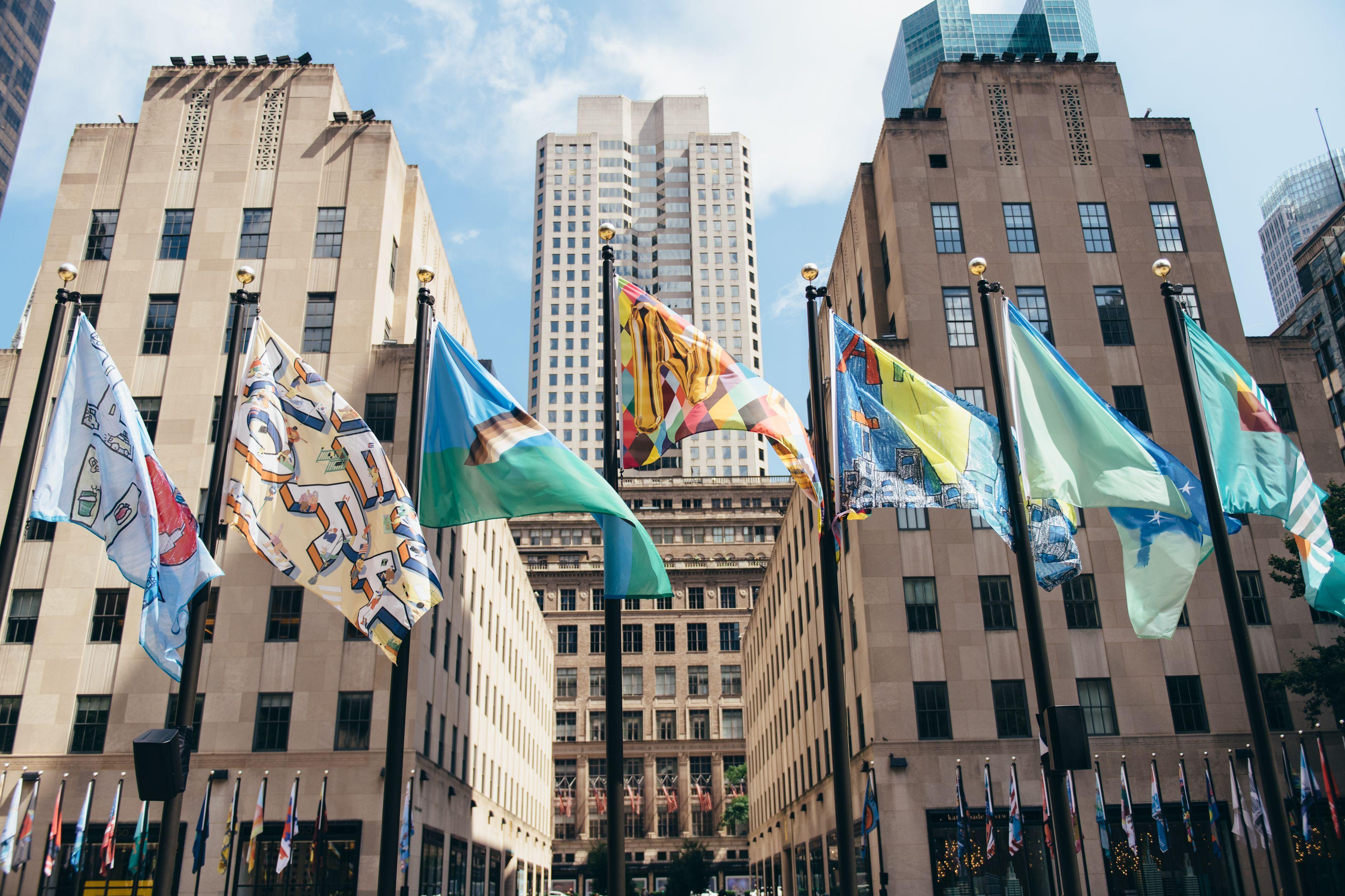 Raised designed flags surrounding the Plaza