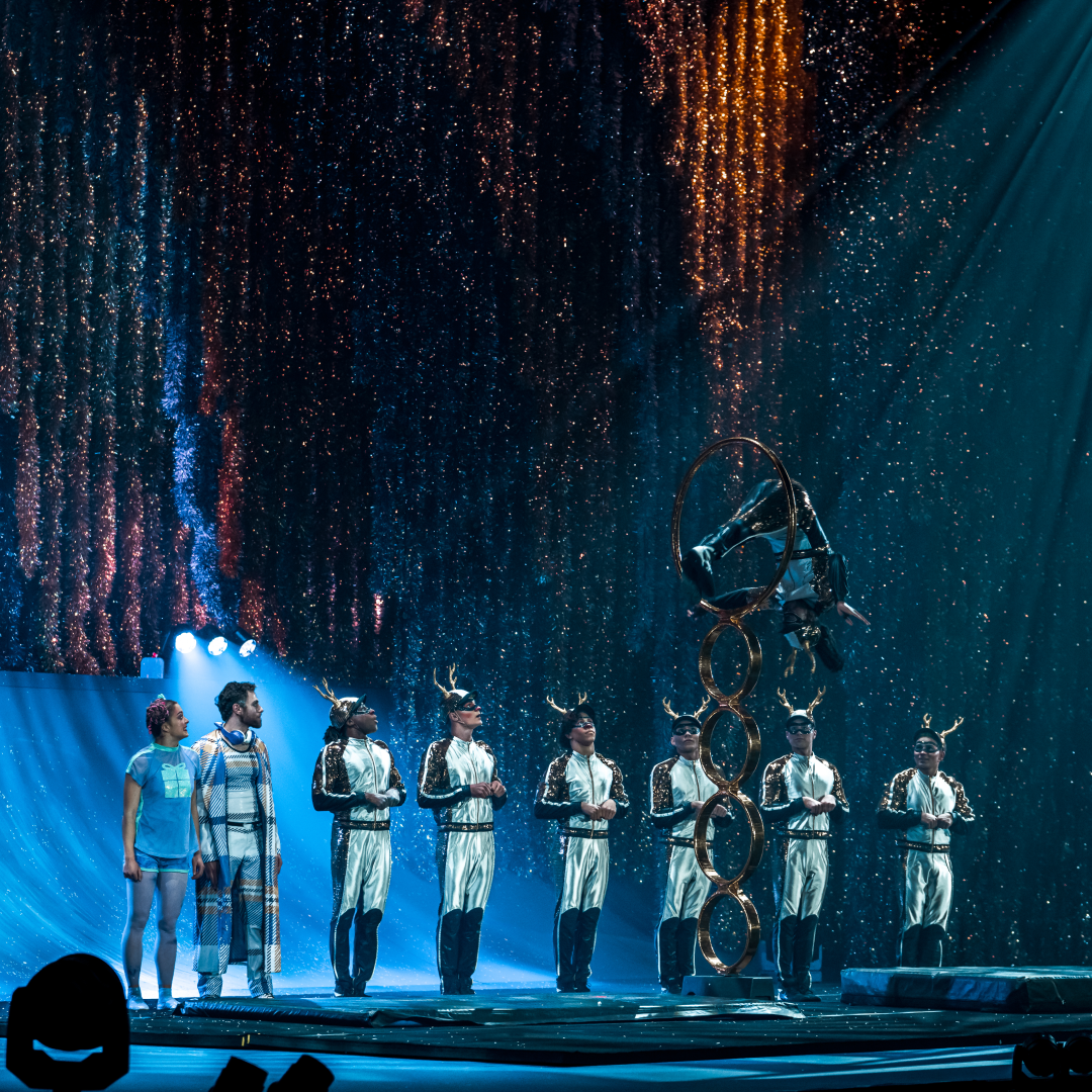 The cast of Cirque du Soleil's "‘Twas the Night Before…" performing on stage at Madison Square Garden