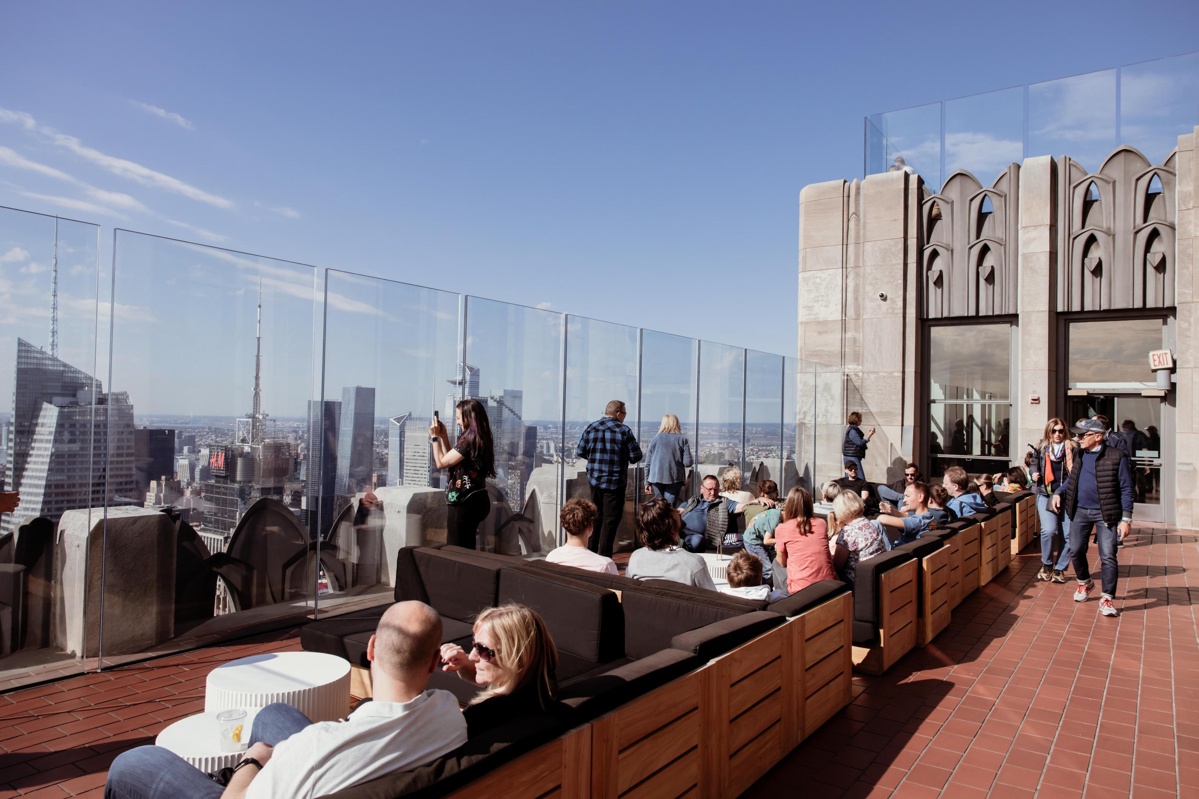 People seated at the Weather Room at the Top of the Rock