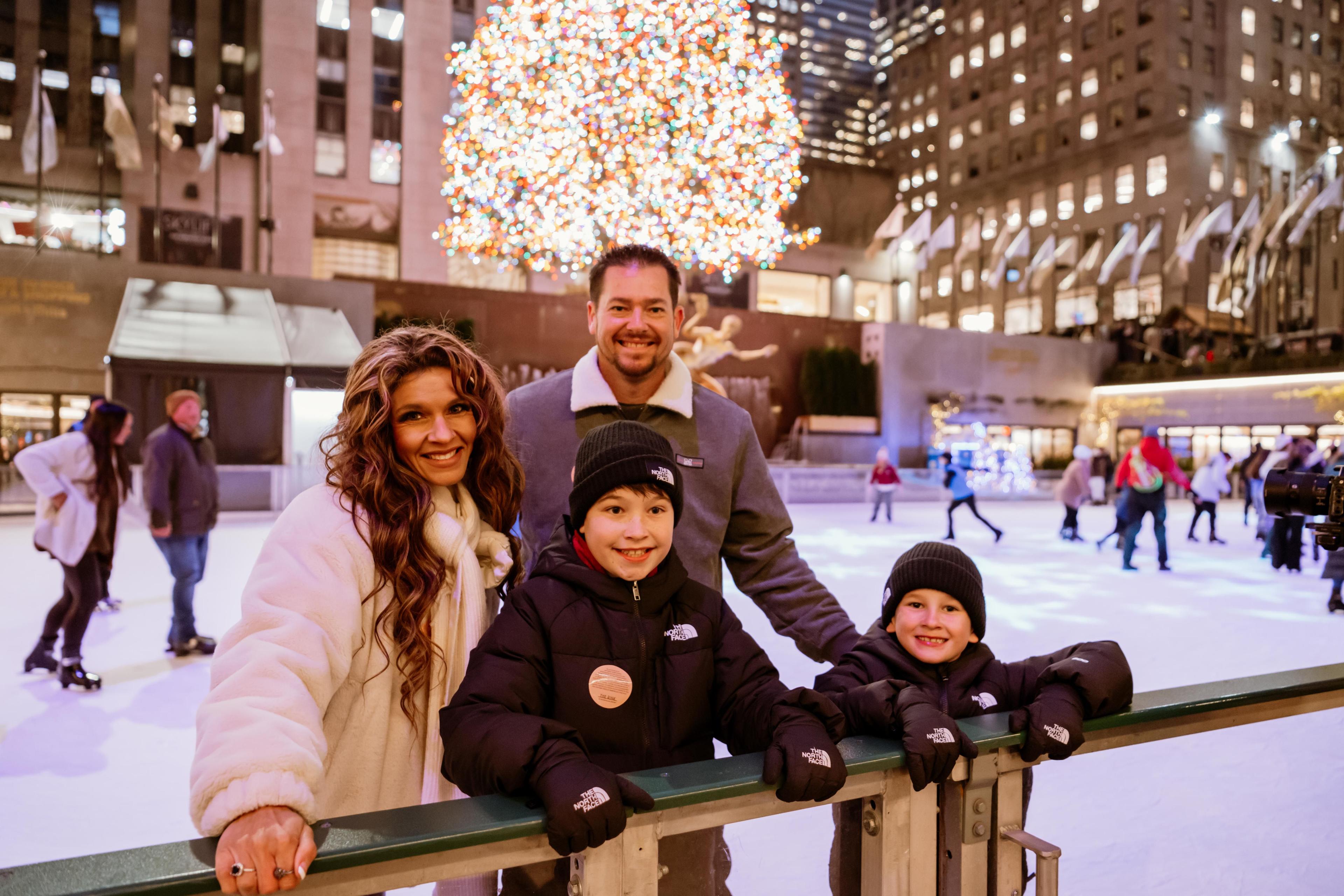 A smiling family at The Rink