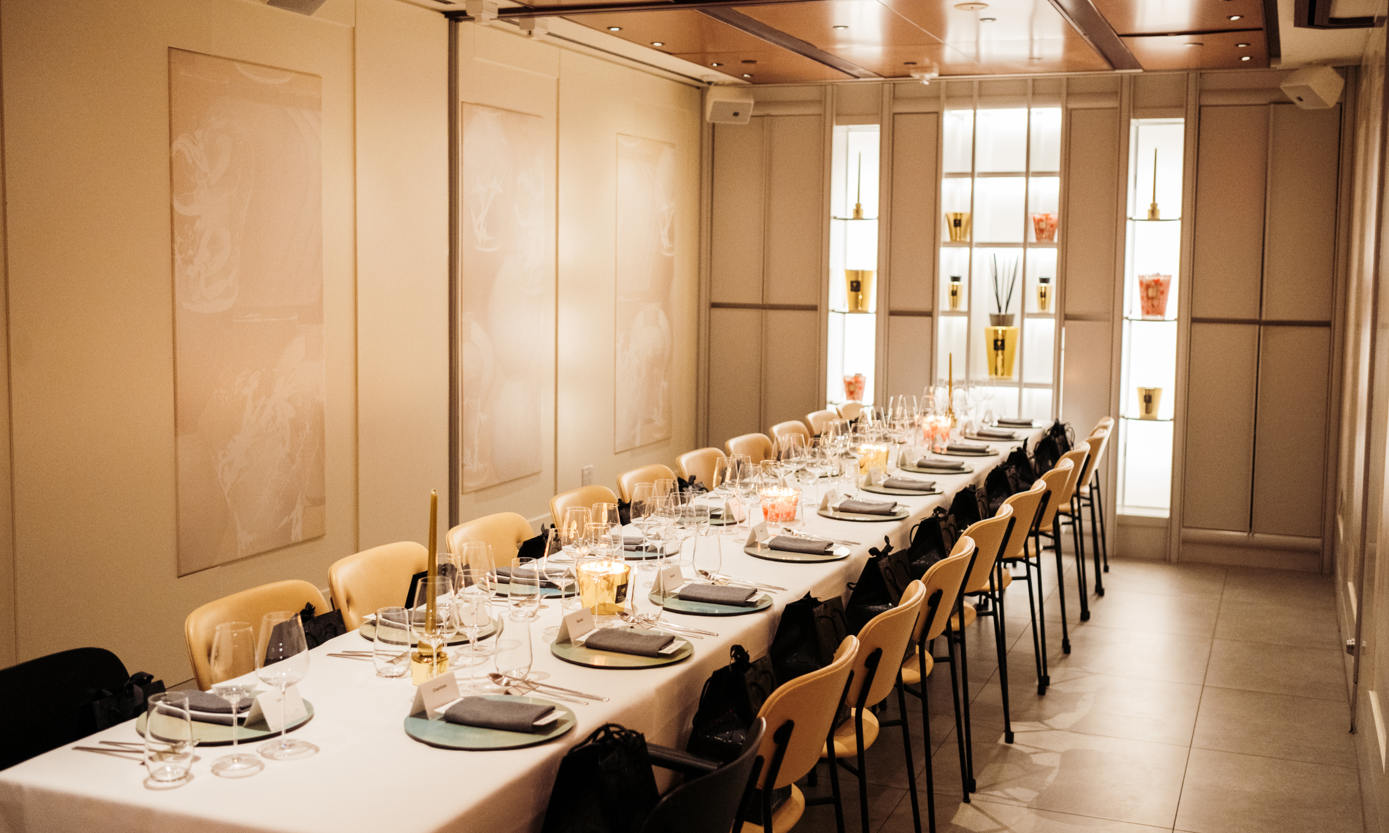 A long table with place settings inside NARO's private dining room
