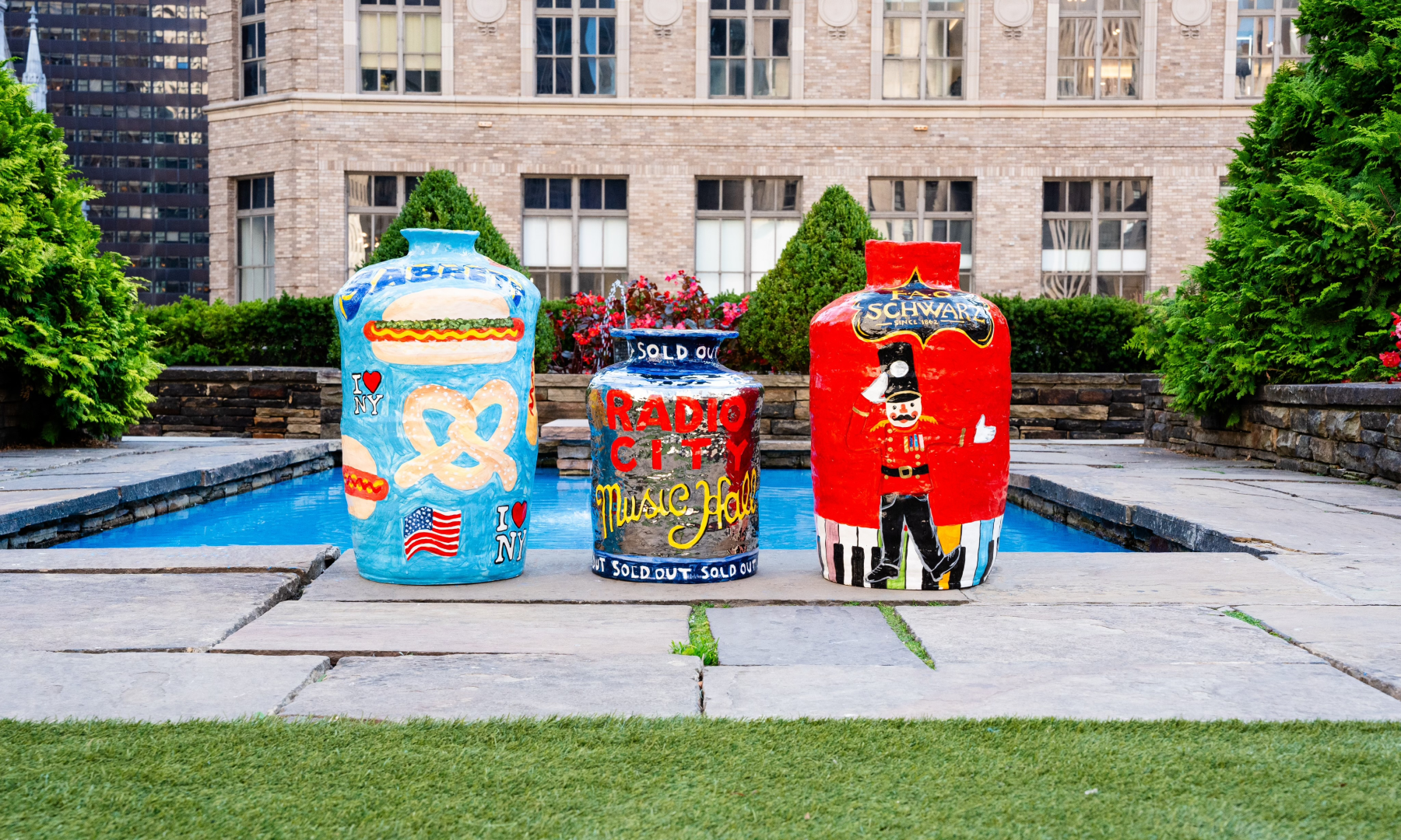 Three of artist Jake Clark's ceramic vessels at Rockefeller Center