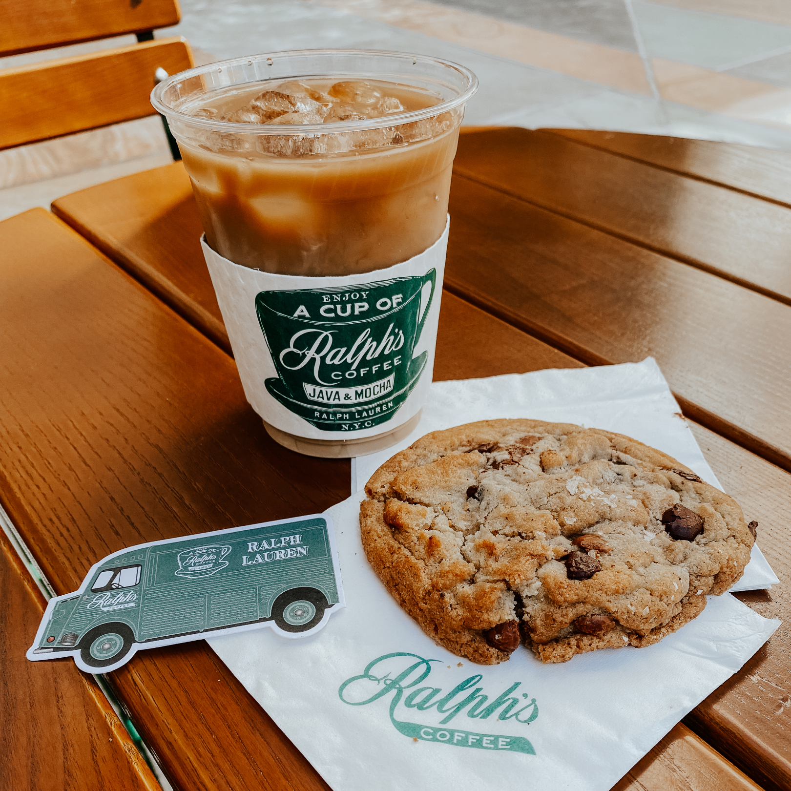 A cup of iced coffee and a cookie from Ralph's Coffee Truck at Rockefeller Center