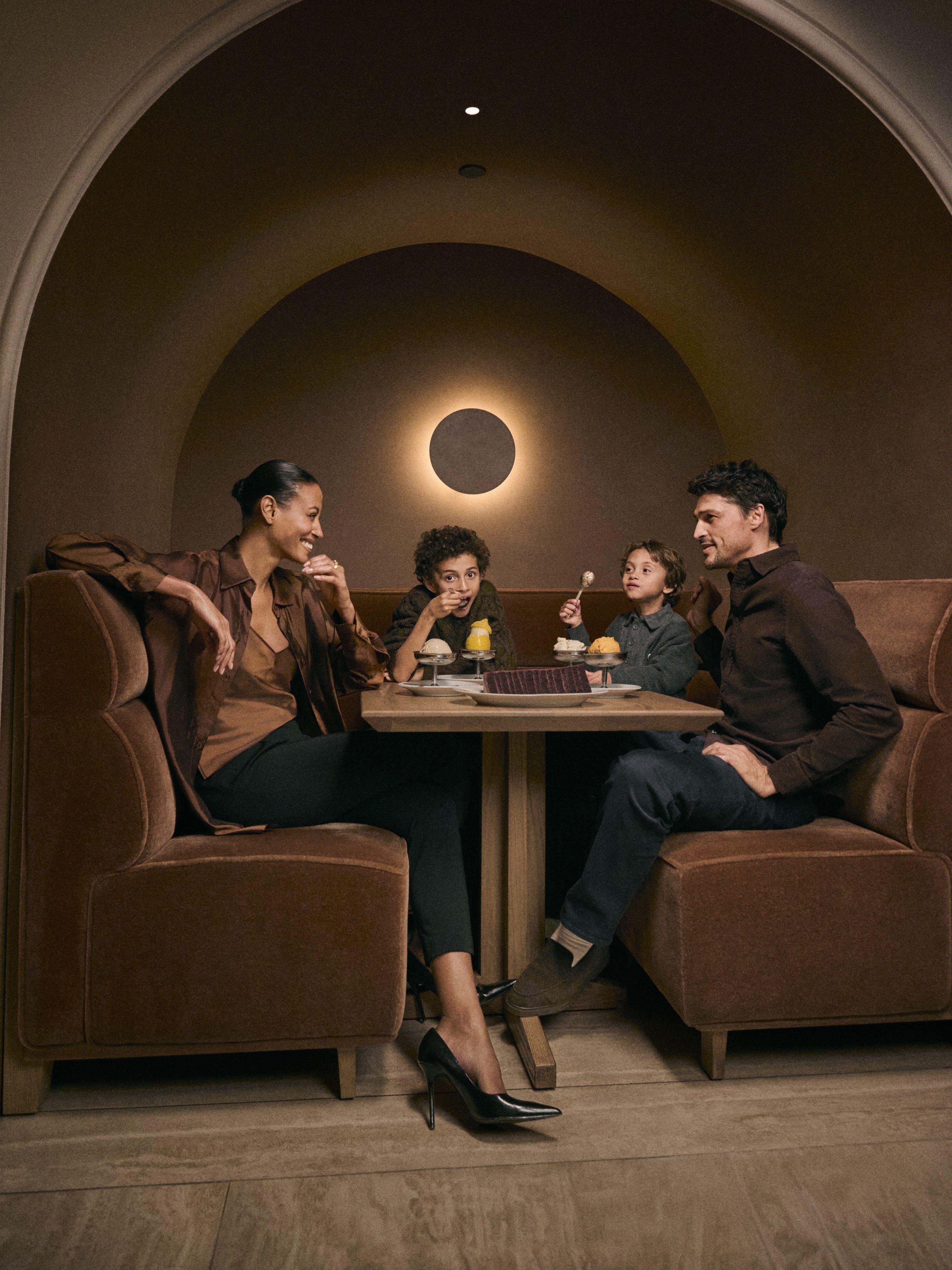 a family dining together at rockefeller center