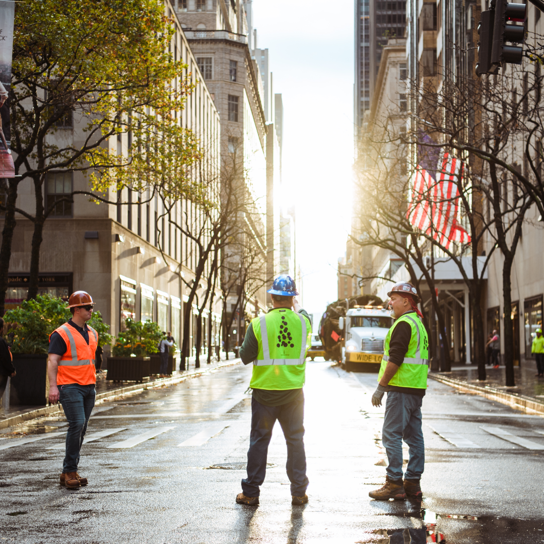 Head gardener for Rockefeller Center Erik Pauze directs two gardeners during Tree Arrival