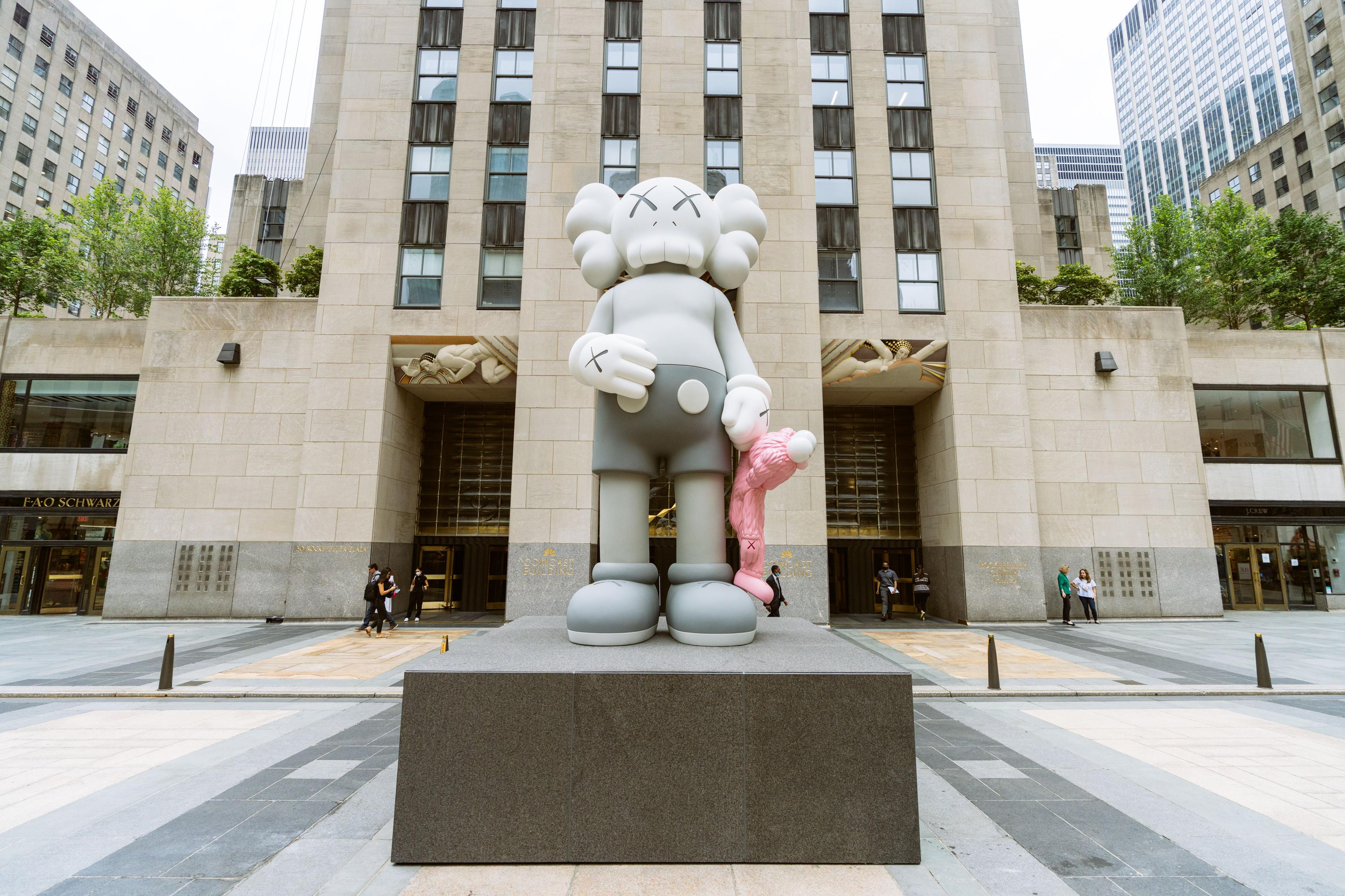 KAWS statue art installation at rockefeller center
