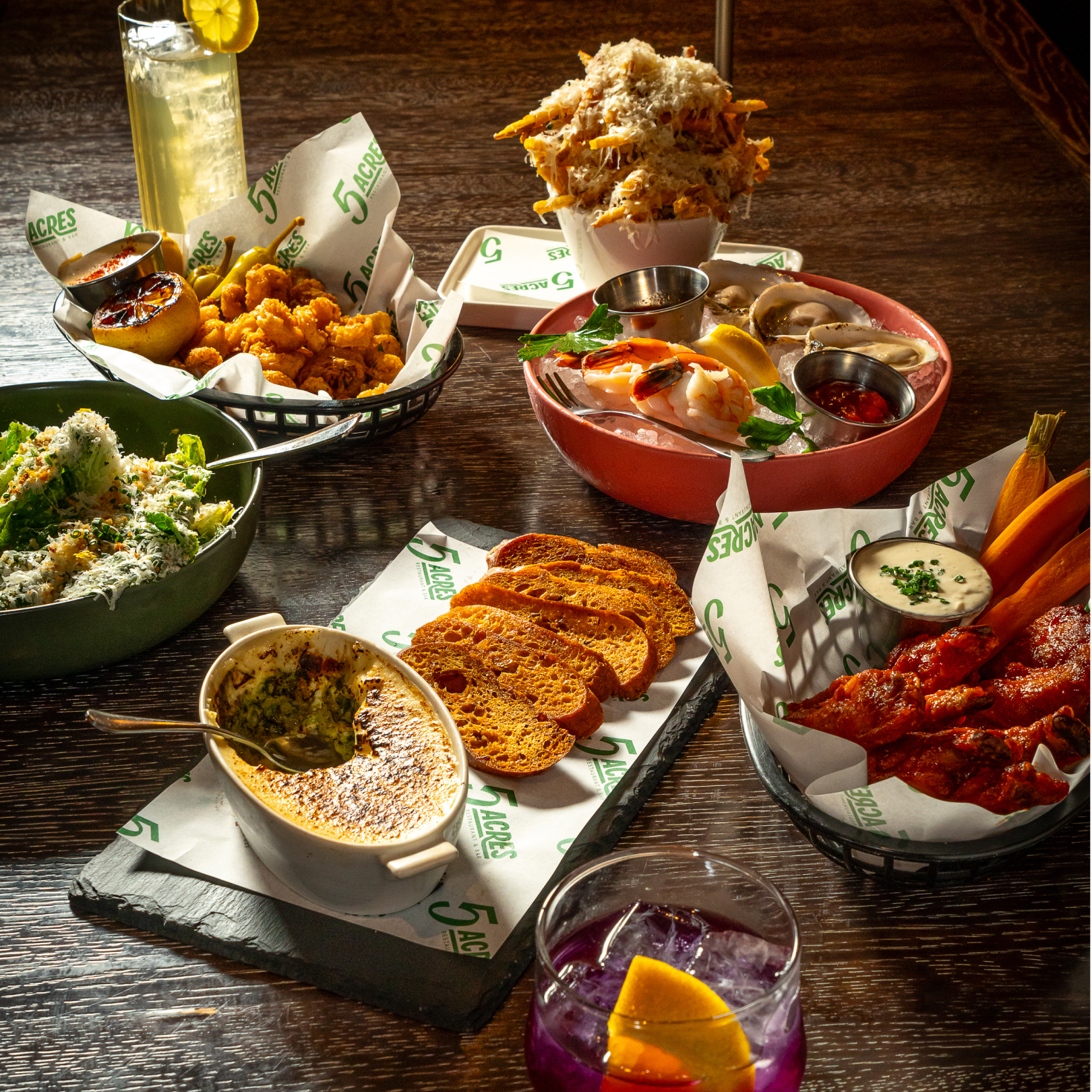 Plates of food from 5 Acres at Rockefeller Center
