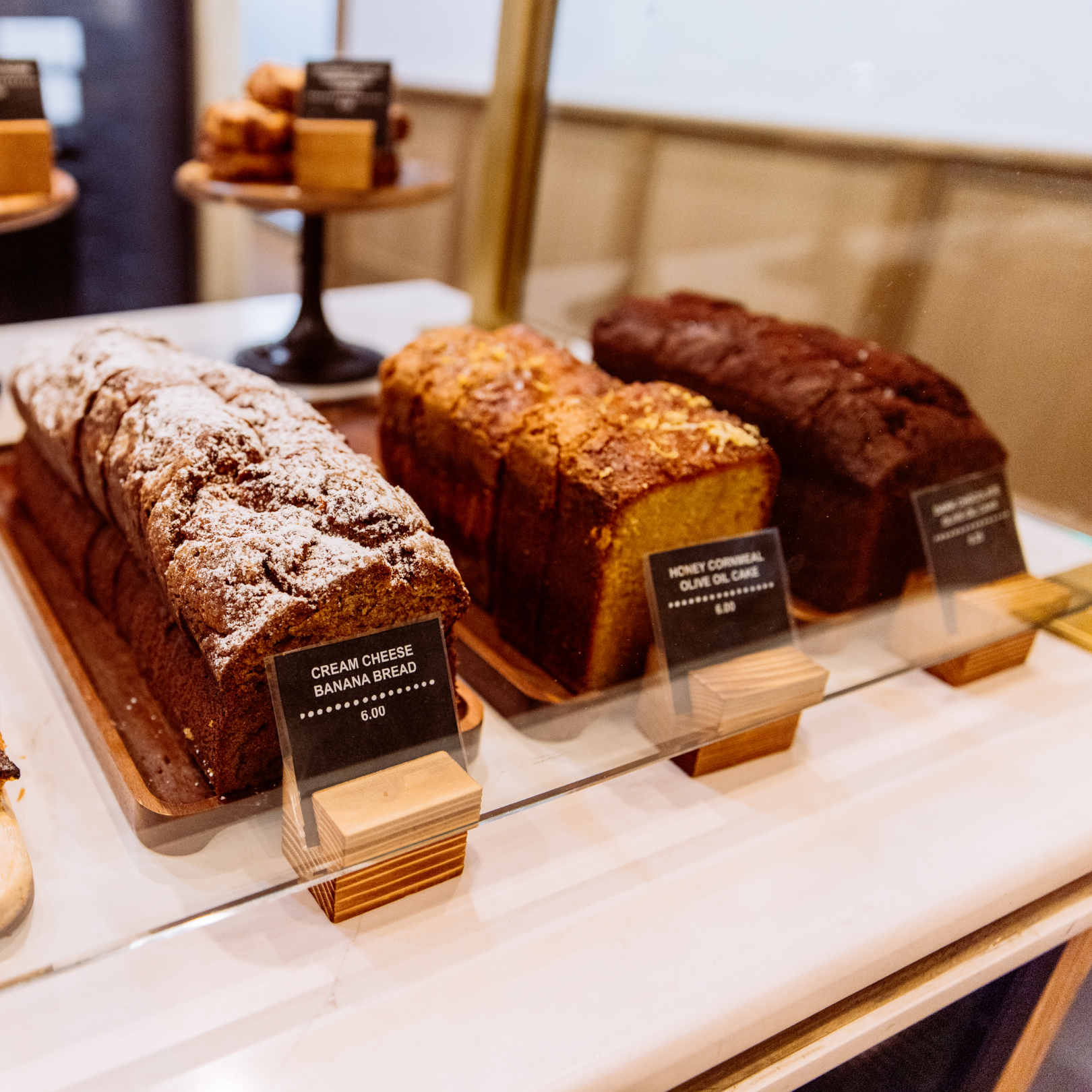 Assorted cakes on display at The Tipsy Baker at Rockefeller Center