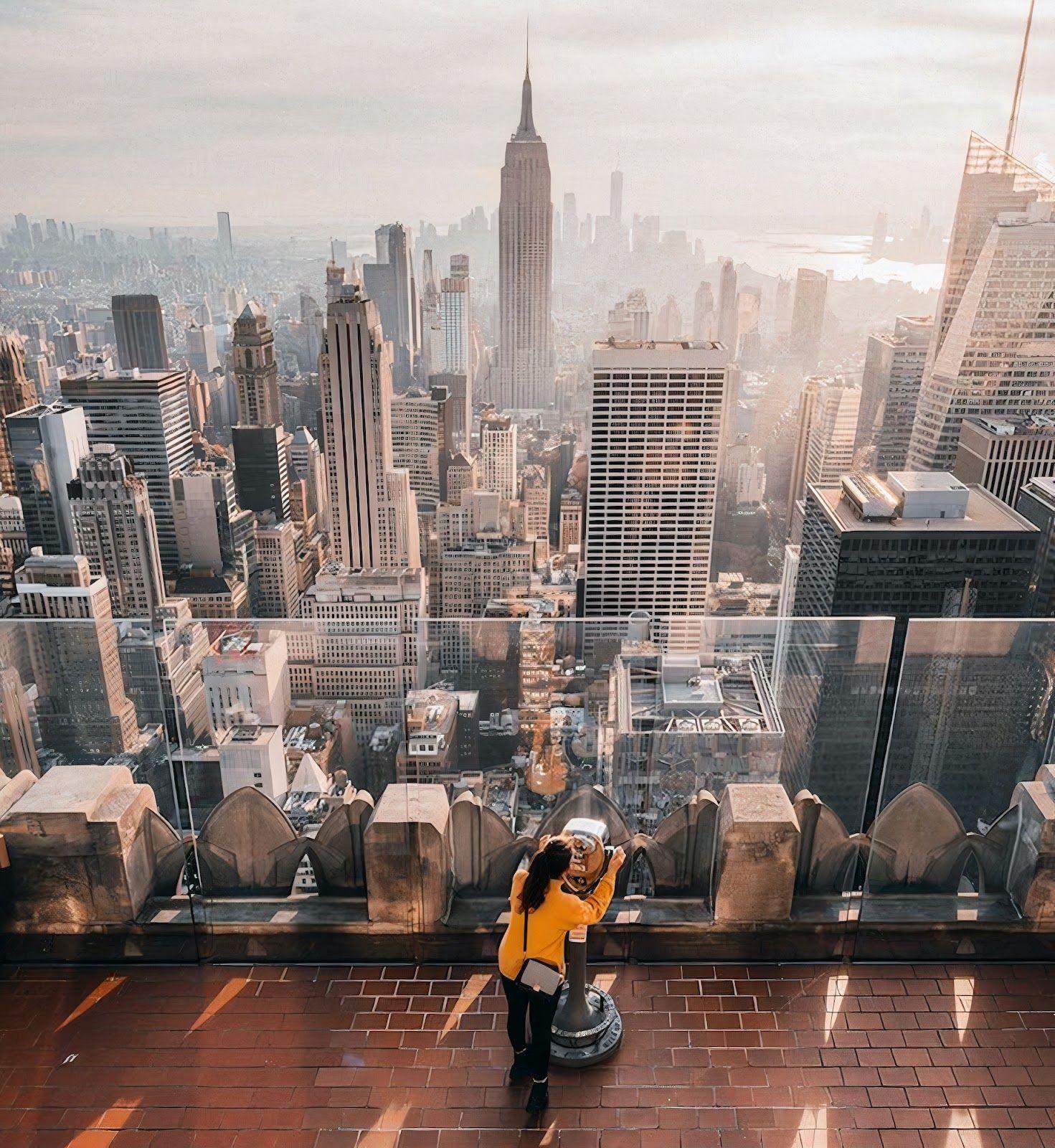 Person enjoying the view from Top of the Rock at Rockefeller Center