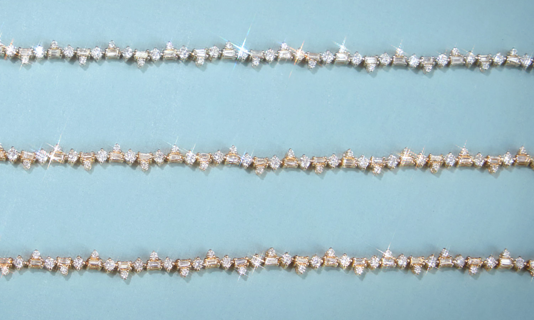 A closeup of three tennis bracelets from Catbird at Rockefeller Center