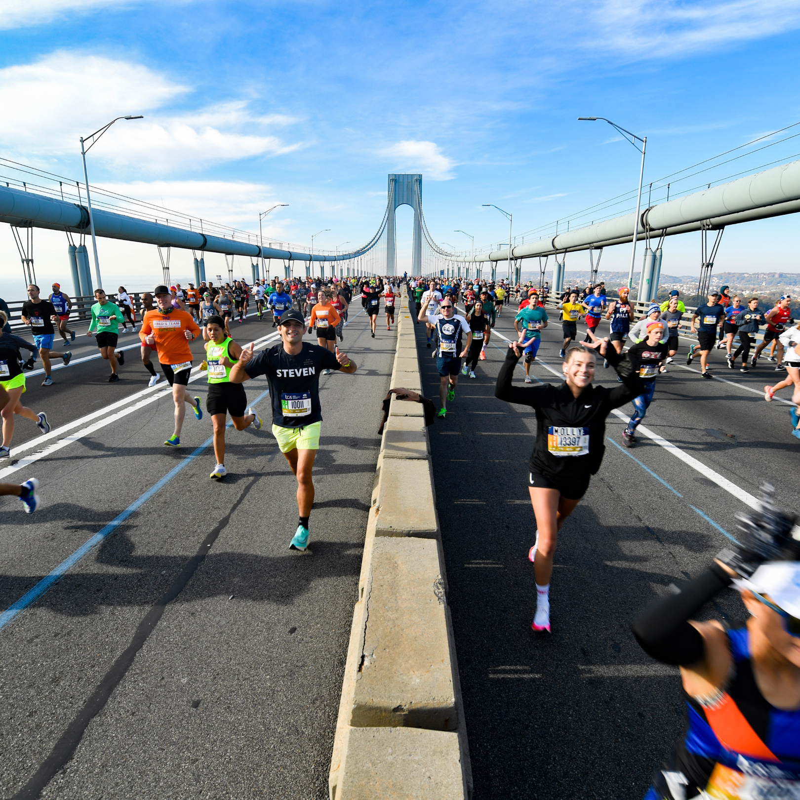 Large crowd of people running the New York City Marathon