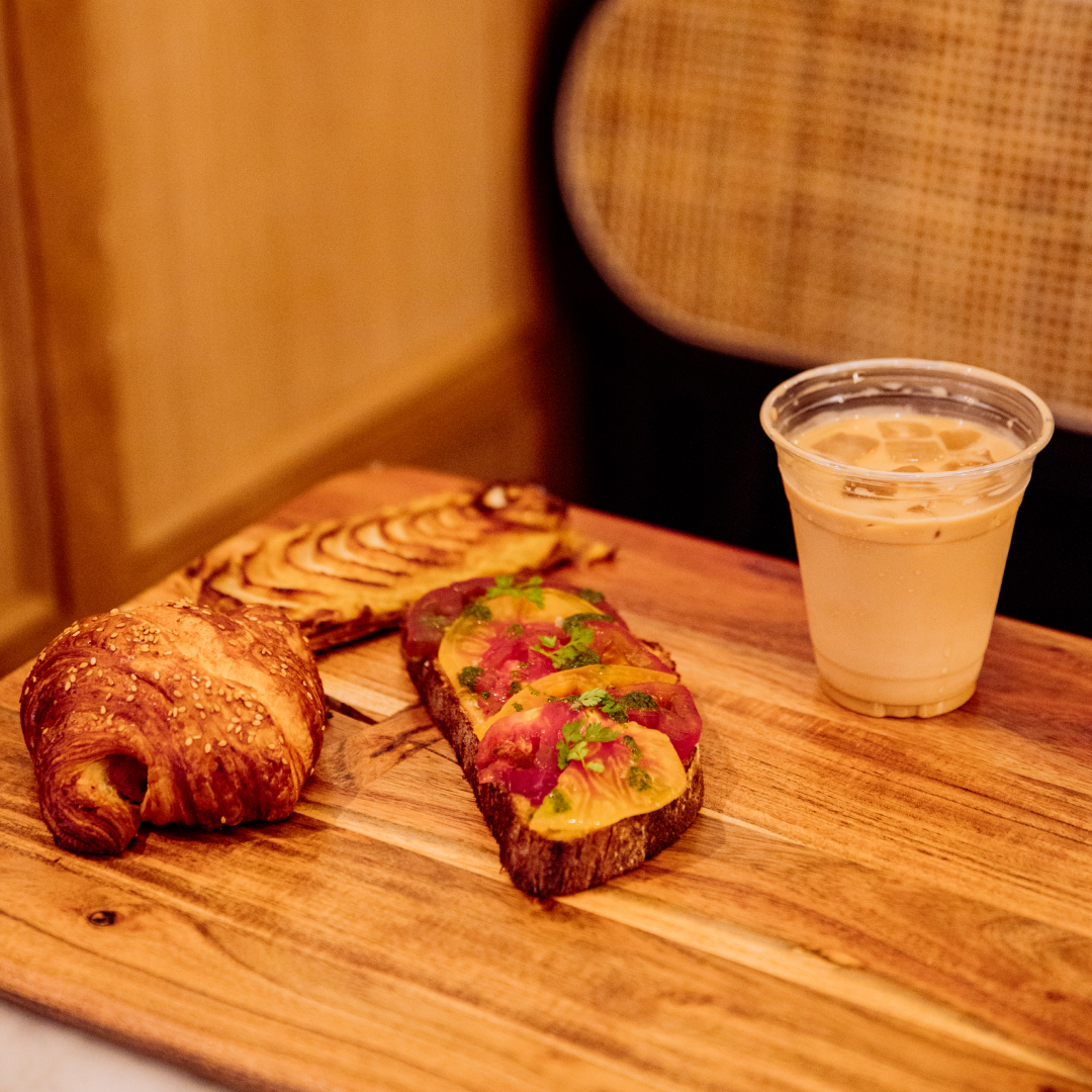 Three sweet and savory pastries and a cup of iced coffee from The Tipsy Baker at Rockefeller Center
