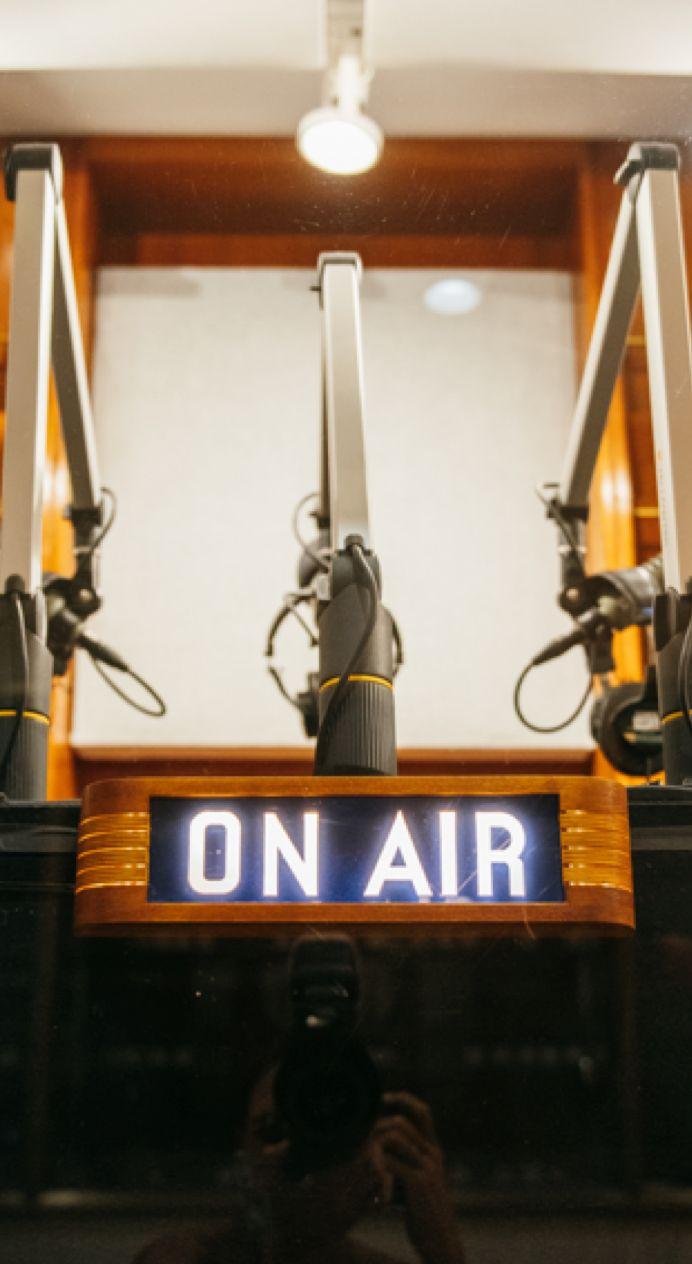 Microphone above an on air sign