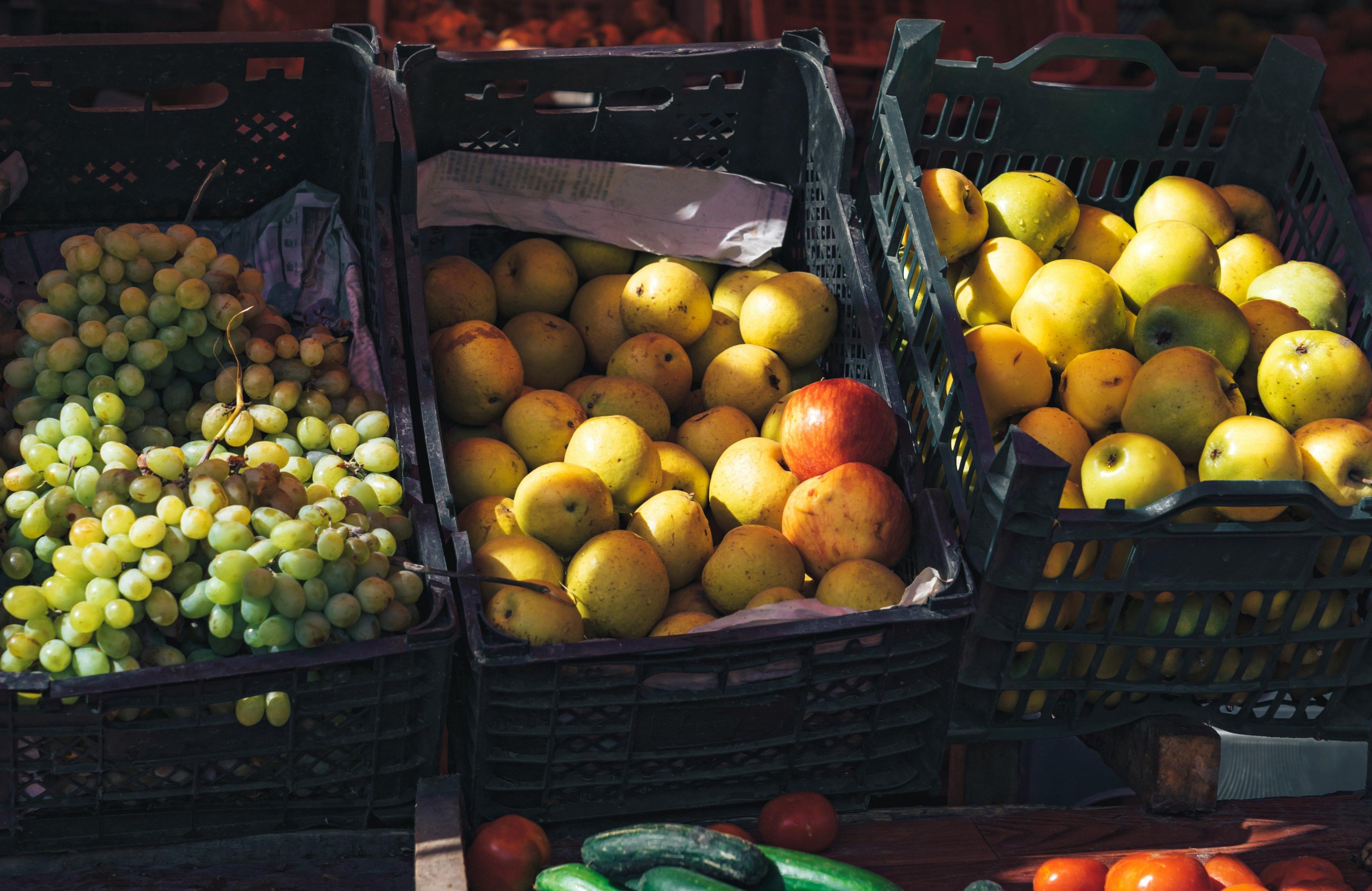 a basket of apples at a farmer's market