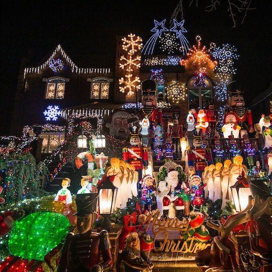 House covered in holiday lights and Christmas decorations
