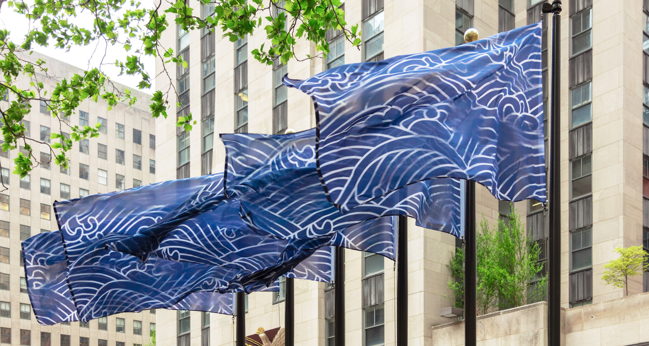 Sanford Biggers Seigaiha installation features flags that surround the Rink