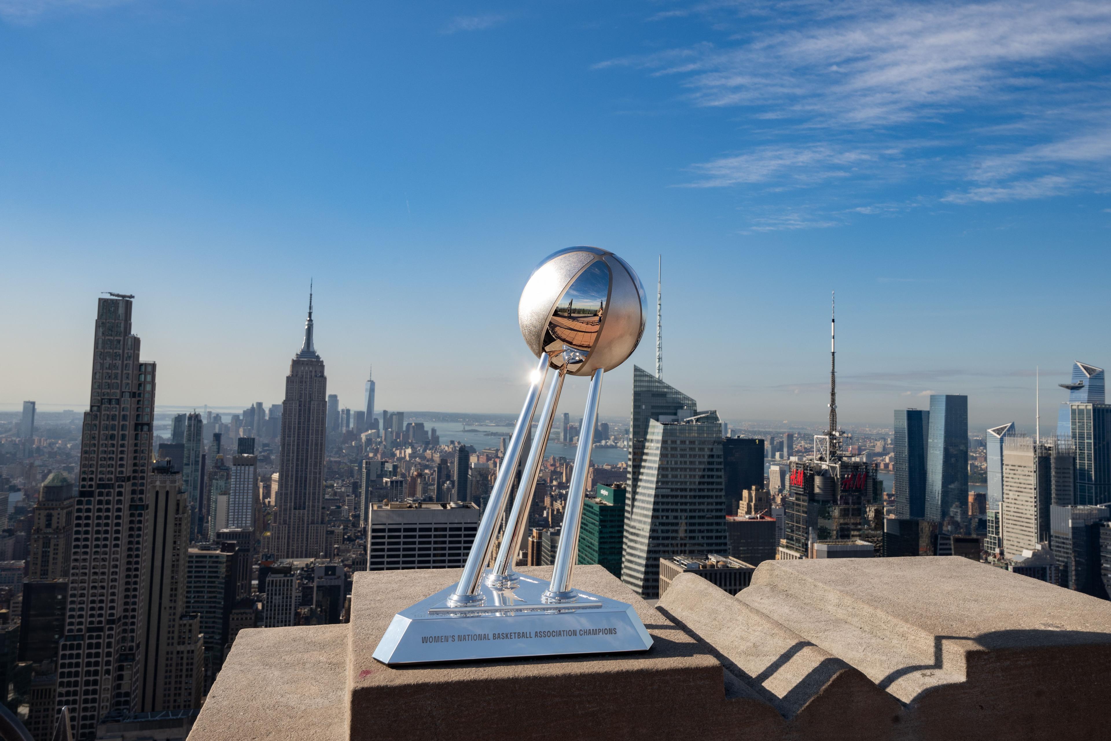 trophy at top of the rock