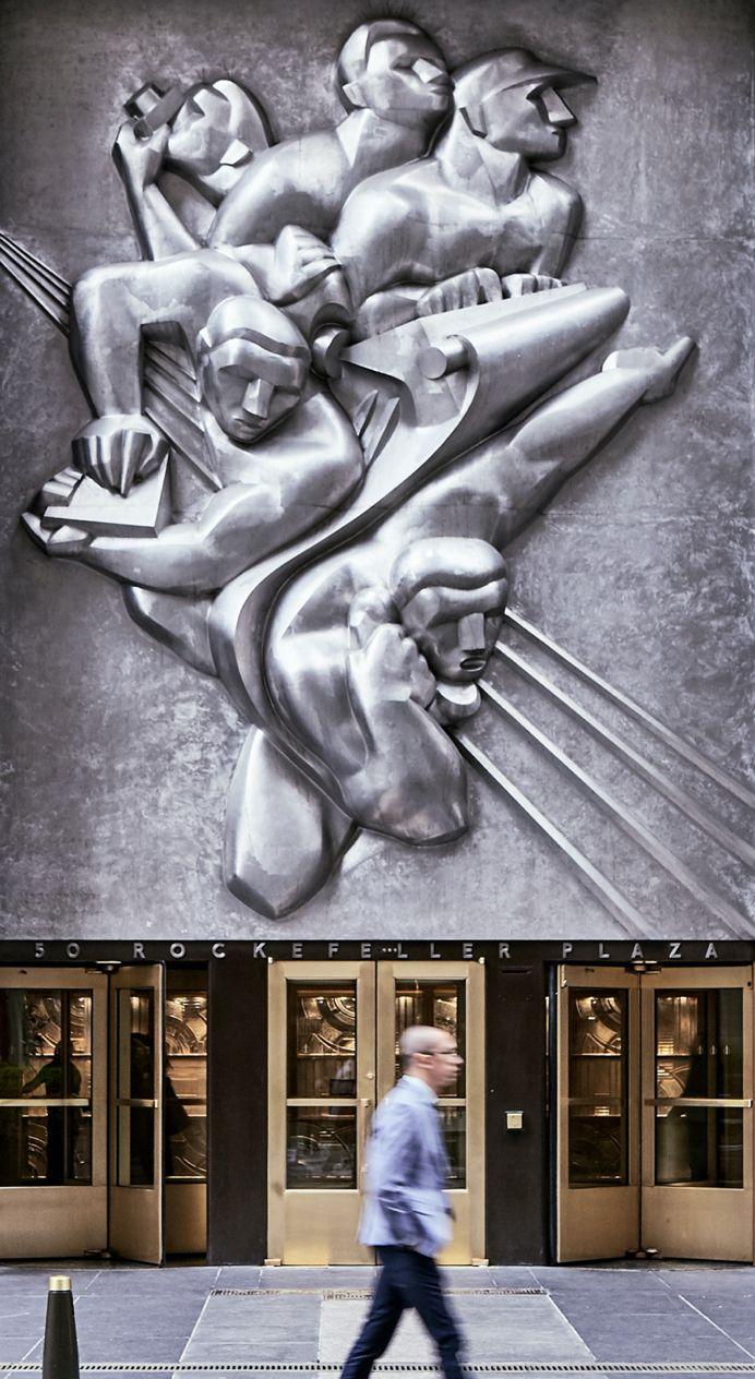 Art Deco relief sculpture above a Rockefeller Center entrance