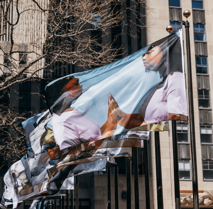 Flags flying over Rockefeller Plaza.