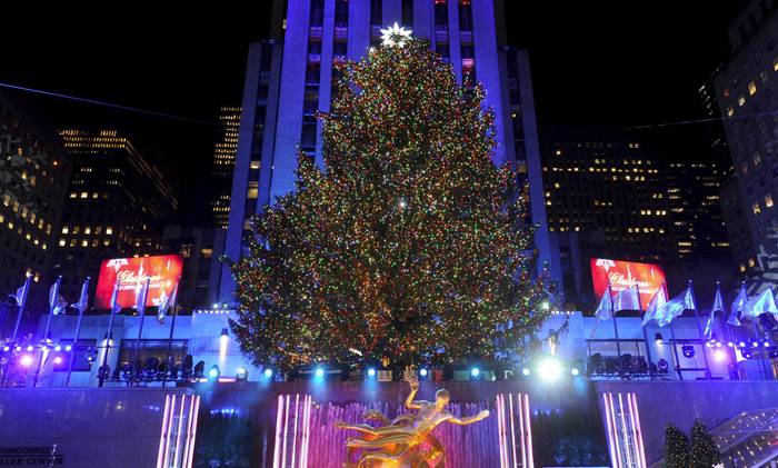 The famous Rockefeller Center Christmas Tree and Prometheus sculpture by The Rink.