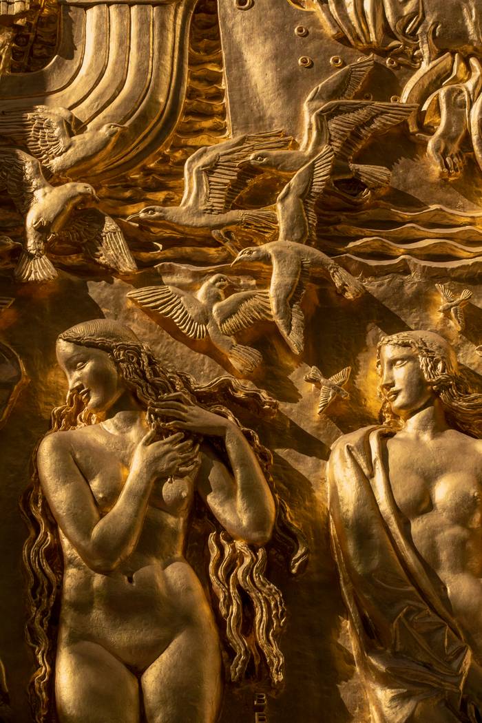 Detail of Lee Lawrie's The Story of Mankind, a carved polychromed and gilded openwork limestone Art Deco sculpture.